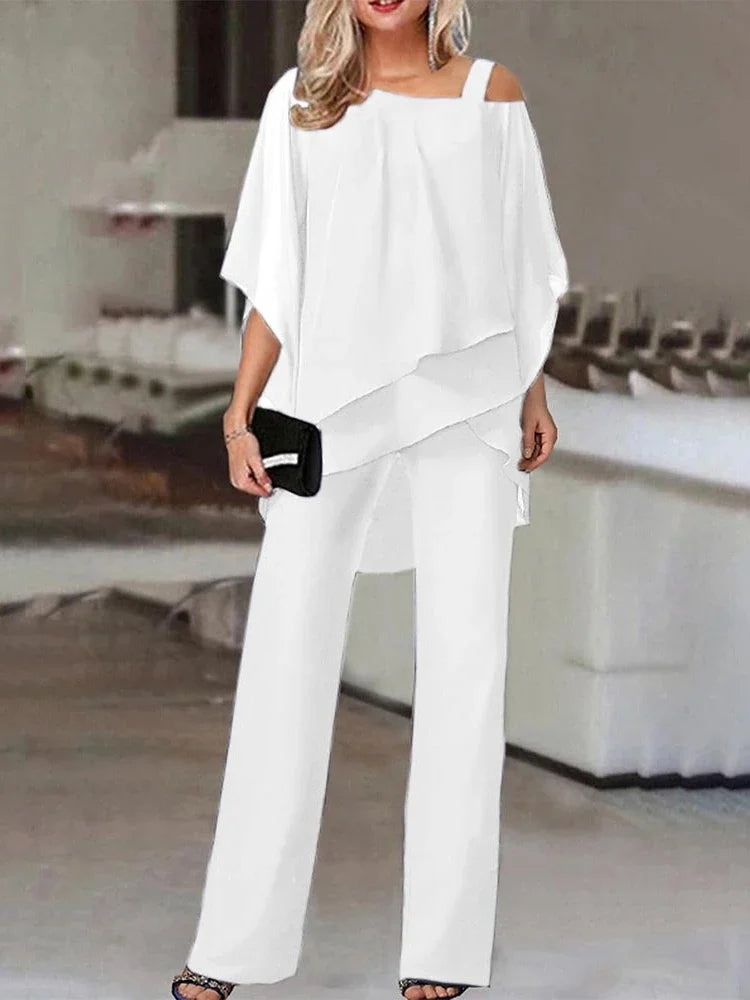 Ensemble élégant femme, top manches chauve-souris, épaules dénudées, grandes tailles, look sophistiqué, style unique.