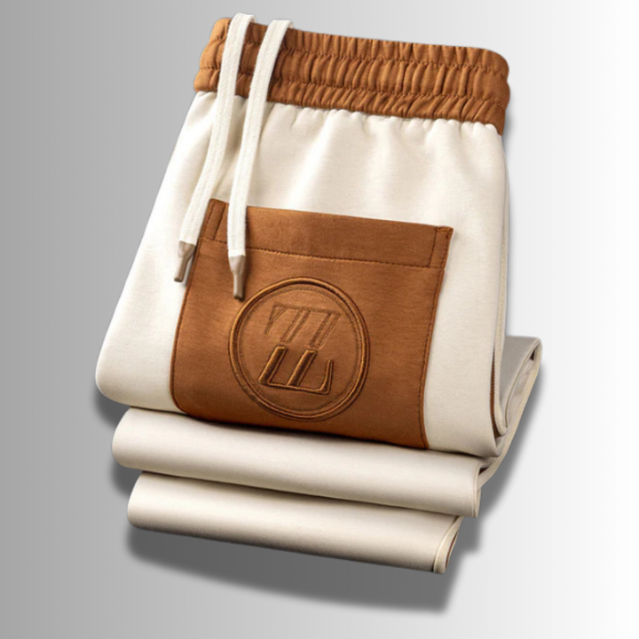 "Ensemble jogging élégant pour hommes, coupe moderne, couleur foncée, tissu respirant, idéal sport et détente."