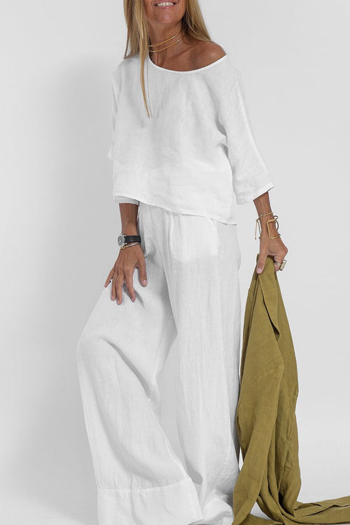"Ensemble tailleur femme coton-lin, haut court chic et pantalon large taille haute, élégant et confortable."
