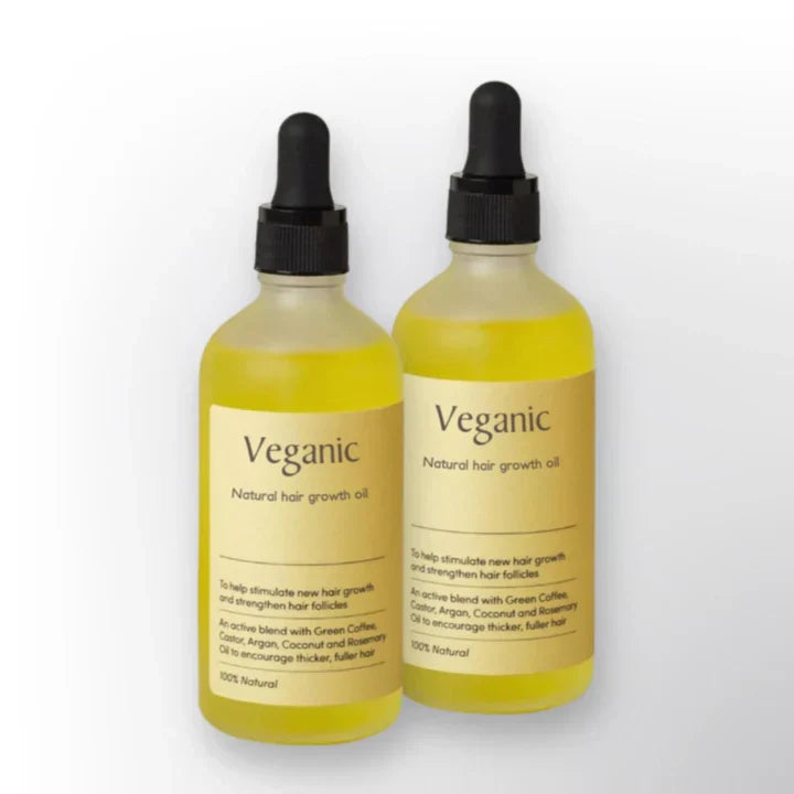 "Flacon d'huile capillaire végane, booste la croissance des cheveux grâce à l'huile d'argan et au romarin."