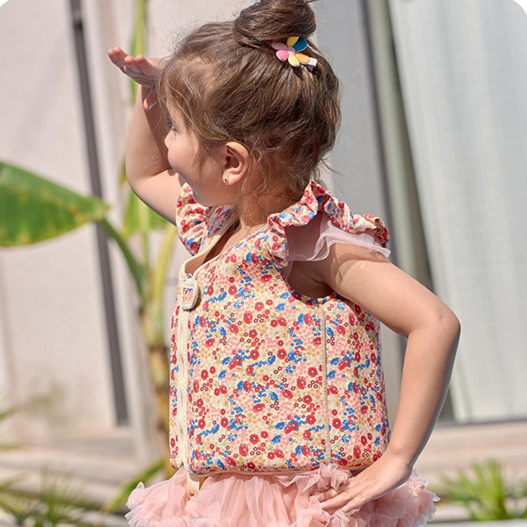 Gilet de natation enfant néoprène, couleurs vives, motifs ludiques, sécurité optimale, flottaison de 2 à 27,5 kg.