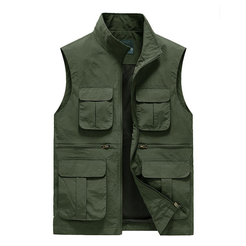 Gilet de voyage bleu marine, léger, séchage rapide, multi-poches, idéal randonnée et aventures extérieures.