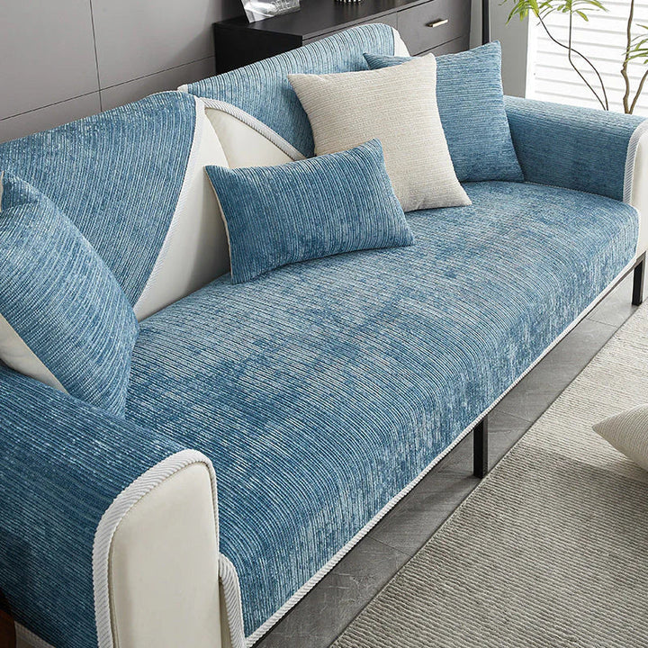 "Housse de canapé anti-griffures moderne, design élégant, écologique, protège la surface, idéale pour animaux de compagnie."