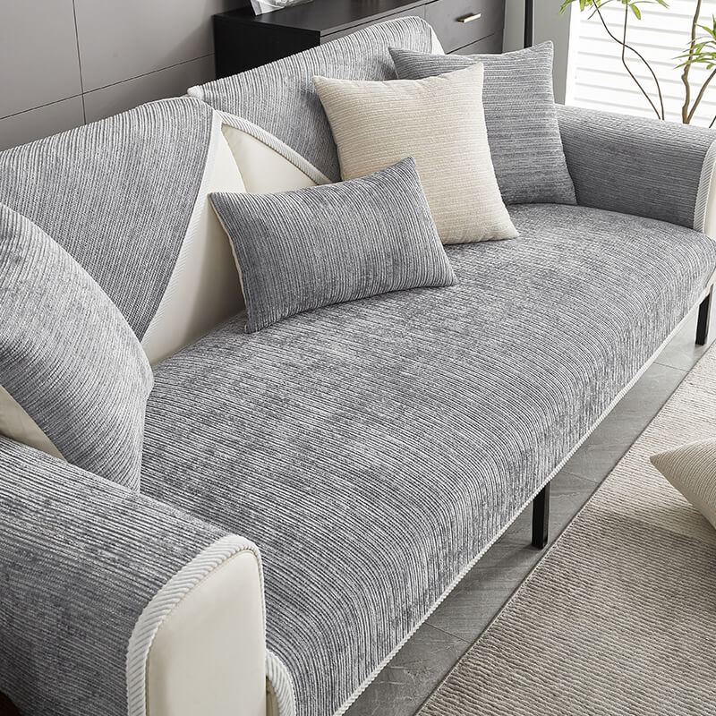 "Housse de canapé anti-griffures moderne, design élégant, écologique, protège la surface, idéale pour animaux de compagnie."