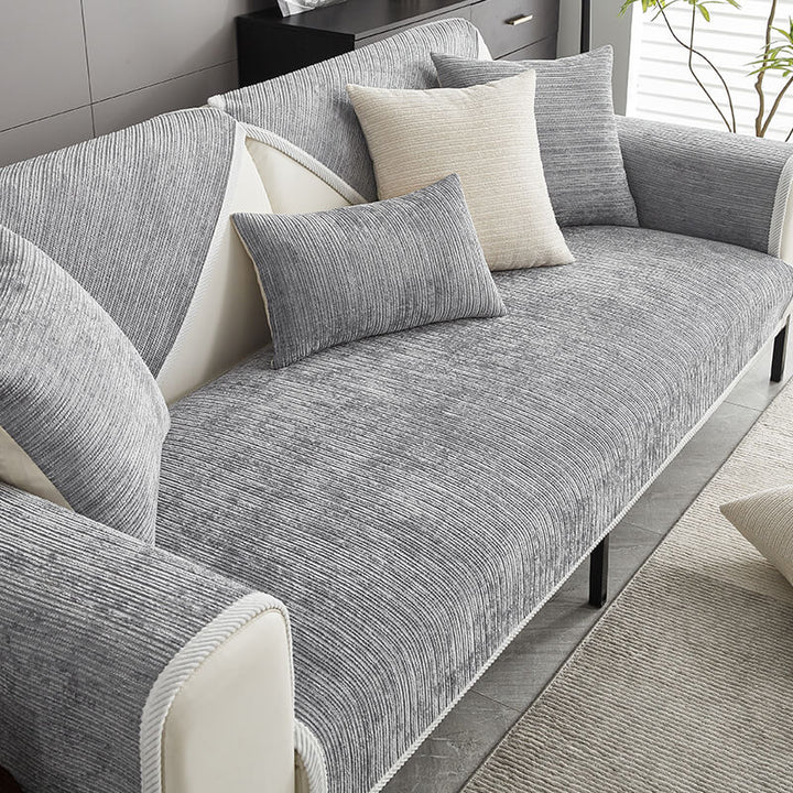 "Housse de canapé anti-griffures moderne, design élégant, écologique, protège la surface, idéale pour animaux de compagnie."