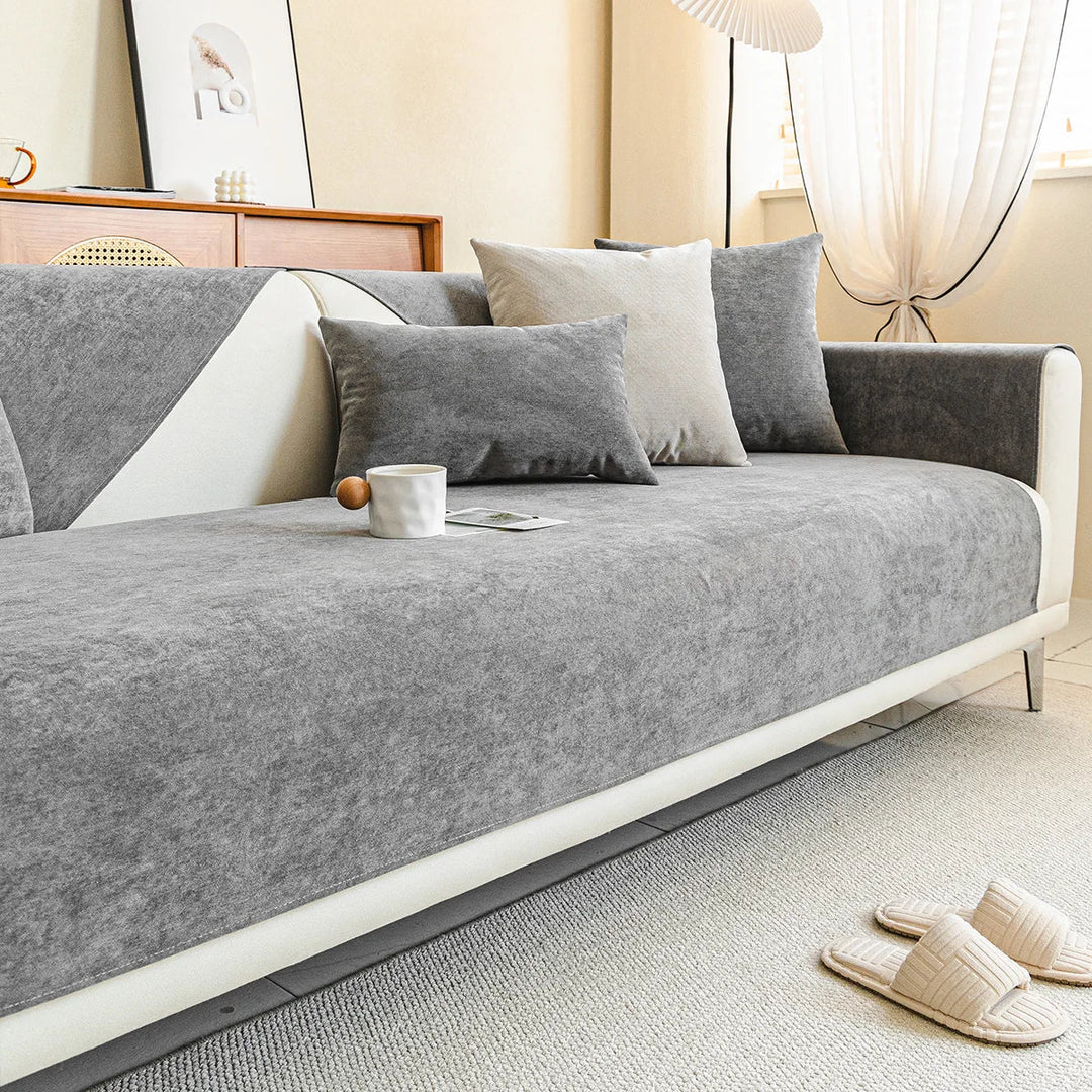 "Housse de canapé anti-griffures moderne, design élégant, écologique, protège la surface, idéale pour animaux de compagnie."