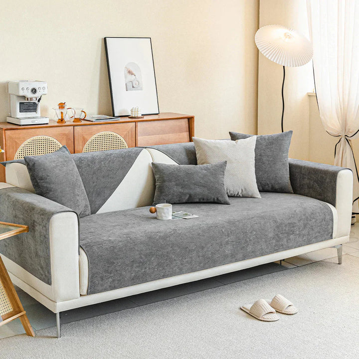 "Housse de canapé anti-griffures moderne, design élégant, écologique, protège la surface, idéale pour animaux de compagnie."