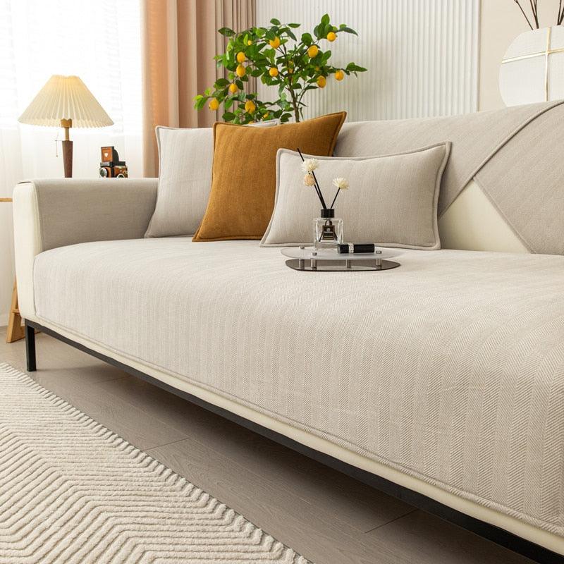 "Housse de canapé antidérapante chic, design moderne, protection contre taches, plusieurs couleurs pour tout décor."
