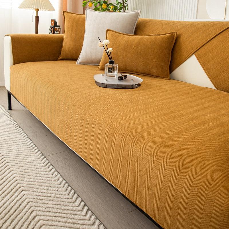 "Housse de canapé antidérapante chic, design moderne, protection contre taches, plusieurs couleurs pour tout décor."