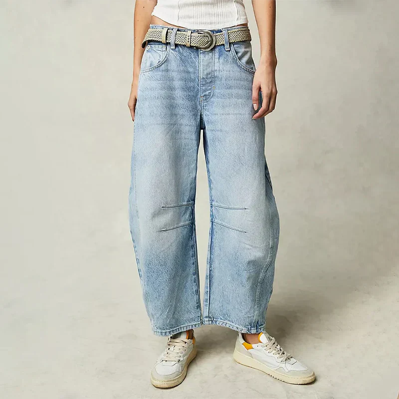 "Jean large femme bleu marine en coton, coupe ample, vue de face, style confortable et élégant pour toutes morphologies."