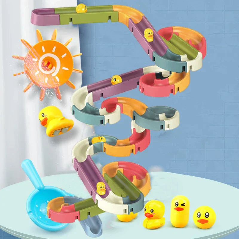 "Jeu de bain canarboggan coloré avec toboggans et canards vibrants, idéal pour l'éveil et le plaisir des enfants"