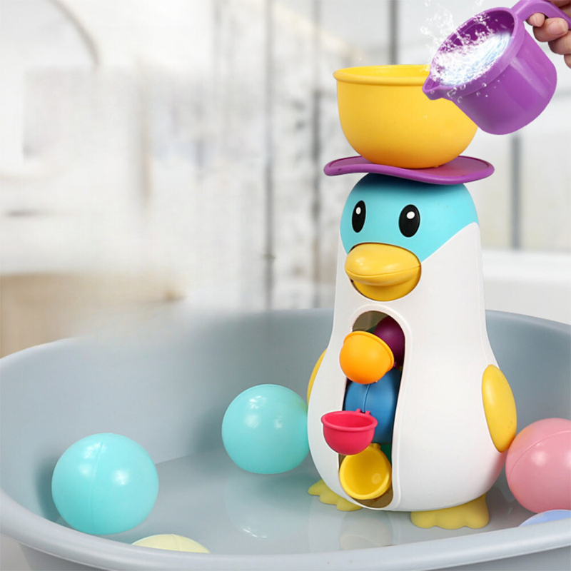 Jouet de bain moulin à eau enfant coloré, en plastique, avec roues tournantes pour un bain ludique et interactif.