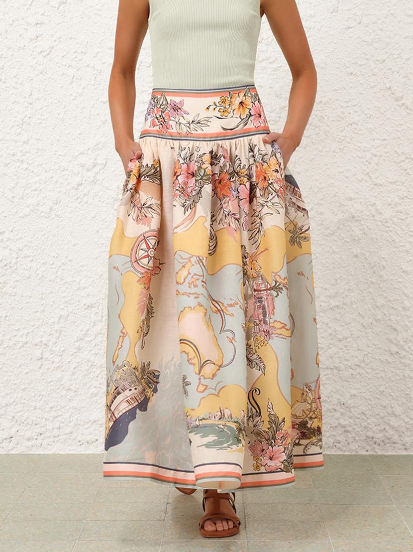 "Jupe midi élégante taille haute avec motifs floraux doux, parfaite pour un look bohème et féminin en toute saison."