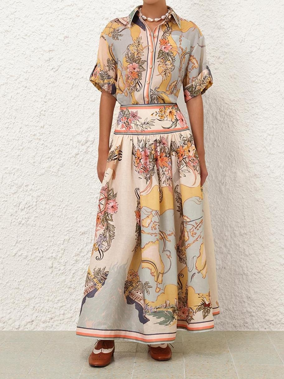 "Jupe midi élégante taille haute avec motifs floraux doux, parfaite pour un look bohème et féminin en toute saison."