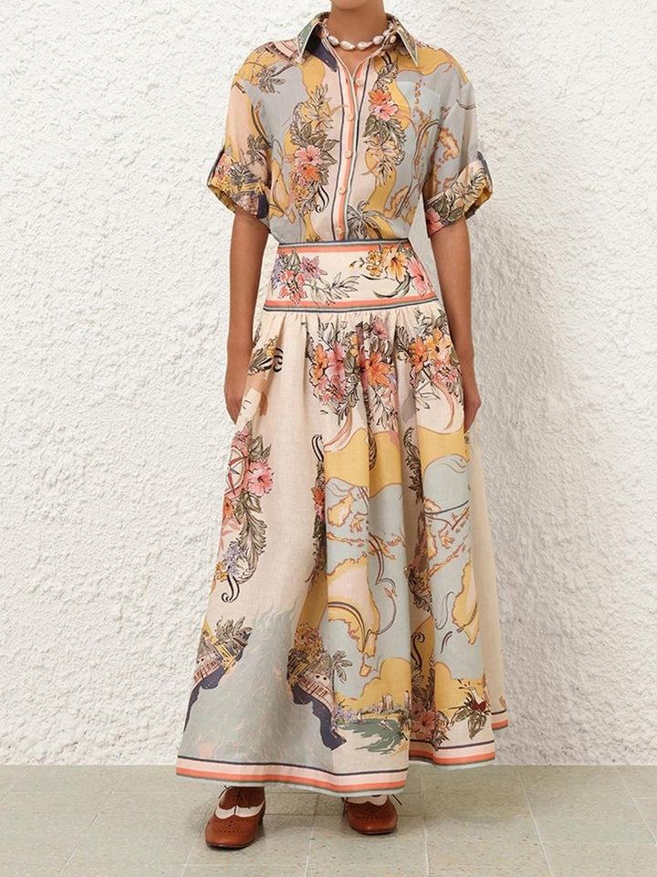 "Jupe midi élégante taille haute avec motifs floraux doux, parfaite pour un look bohème et féminin en toute saison."