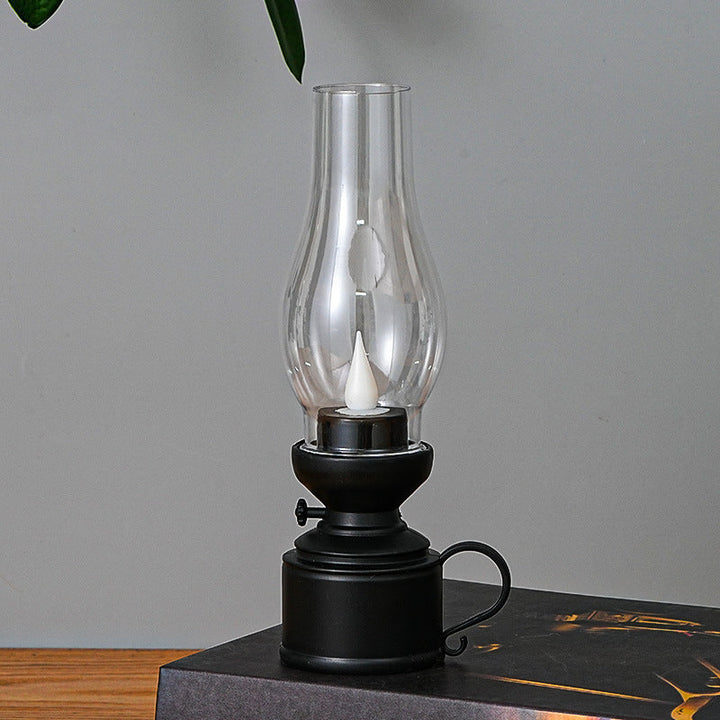 "Lampe à huile LED élégante avec effet de flamme réaliste et choix de couleurs, idéale pour une ambiance chaleureuse et sécur