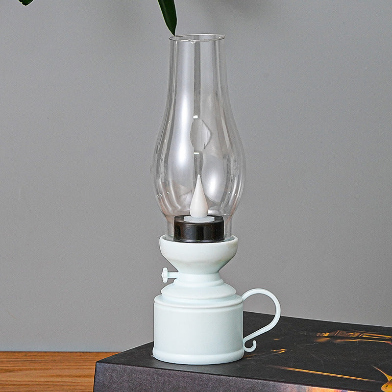 "Lampe à huile LED élégante avec effet de flamme réaliste et choix de couleurs, idéale pour une ambiance chaleureuse et sécur