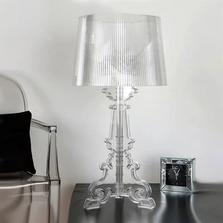 "Lampe de table élégante et glamour, design contemporain en blanc ou noir, éclairage doux pour ambiance luxueuse."