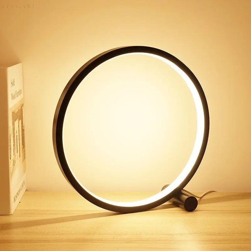 "Lampe de table LED tactile moderne au design circulaire, minimaliste, offrant un éclairage élégant."