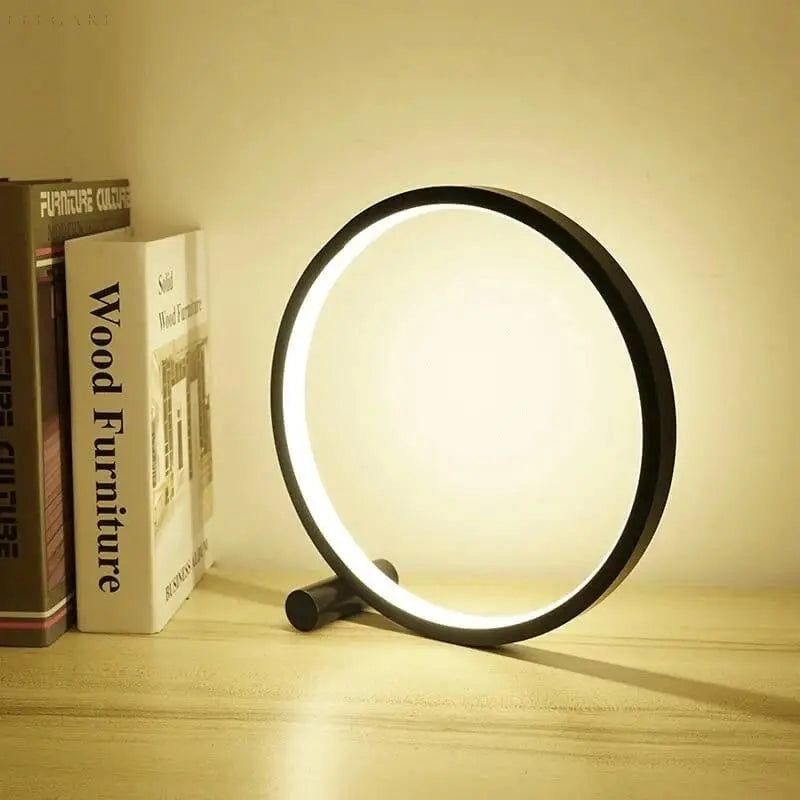 "Lampe de table LED tactile moderne au design circulaire, minimaliste, offrant un éclairage élégant."