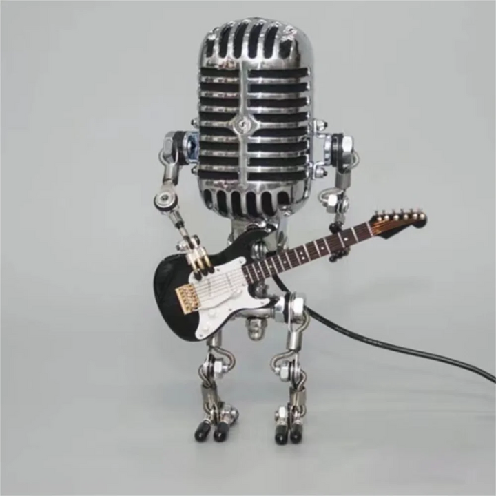 "Lampe de table robotique avec guitare, design original et artistique, ambiance chaleureuse pour décoration intérieure"