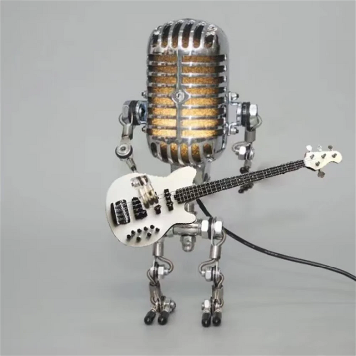 "Lampe de table robotique avec guitare, design original et artistique, ambiance chaleureuse pour décoration intérieure"