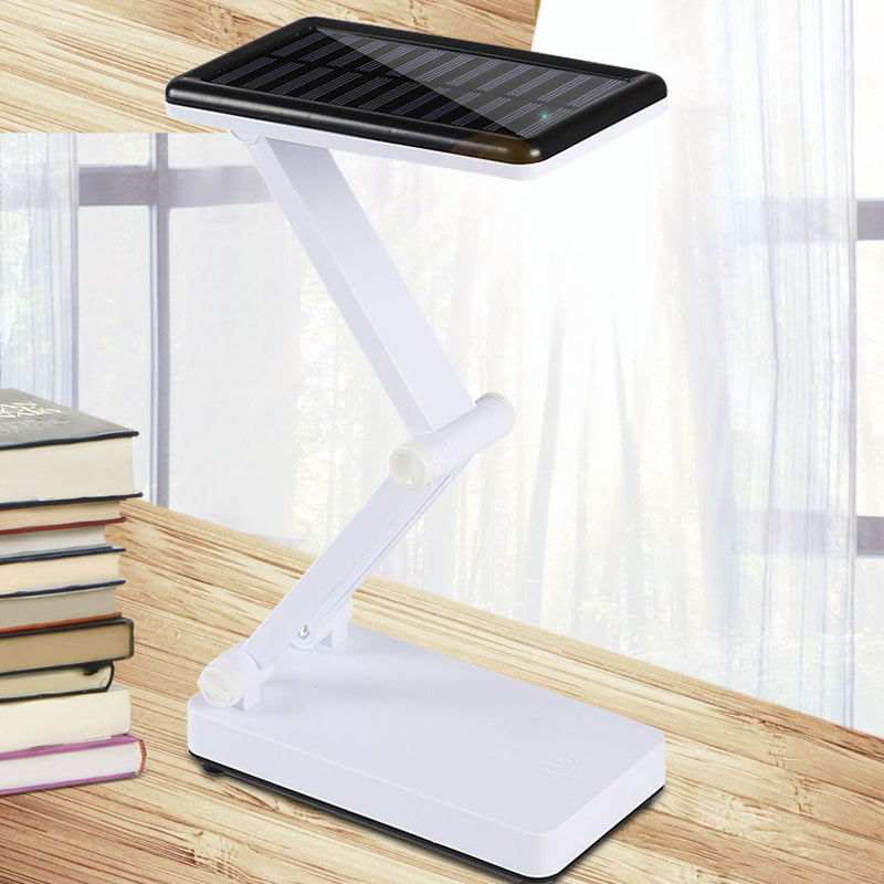 Lampe LED pliable rechargeable solaire, design compact, coloris Blanc, Rose, Vert pour intérieur et extérieur.