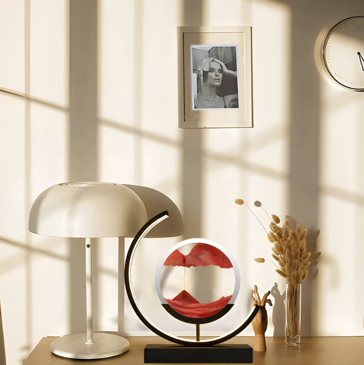 Lampe LED Sand Glow avec sable mouvant, commande à distance, éclairage apaisant, métal et verre, moderne et élégant.