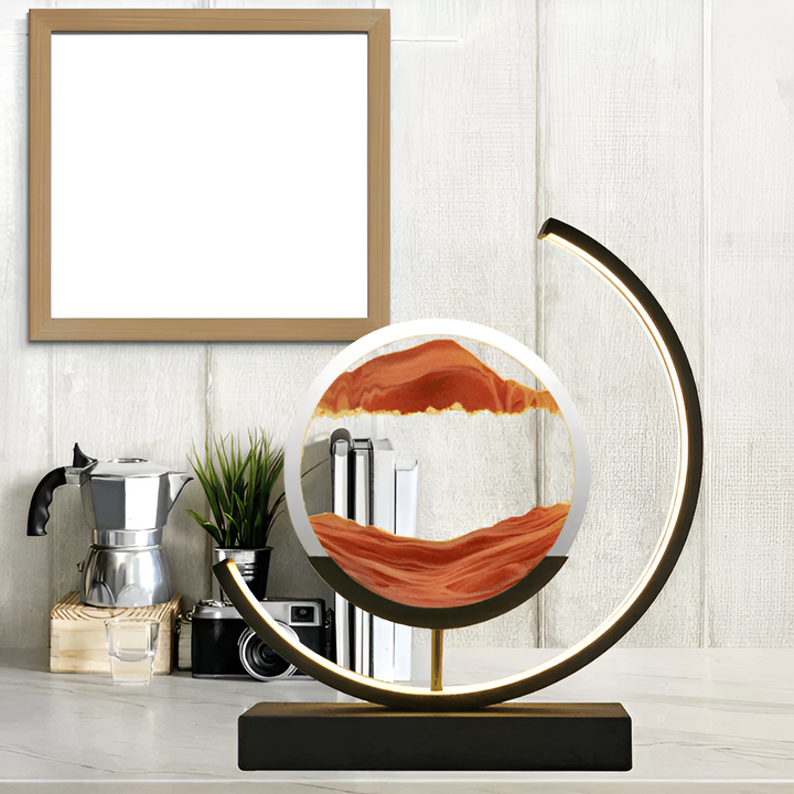 Lampe LED Sand Glow avec sable mouvant, commande à distance, éclairage apaisant, métal et verre, moderne et élégant.