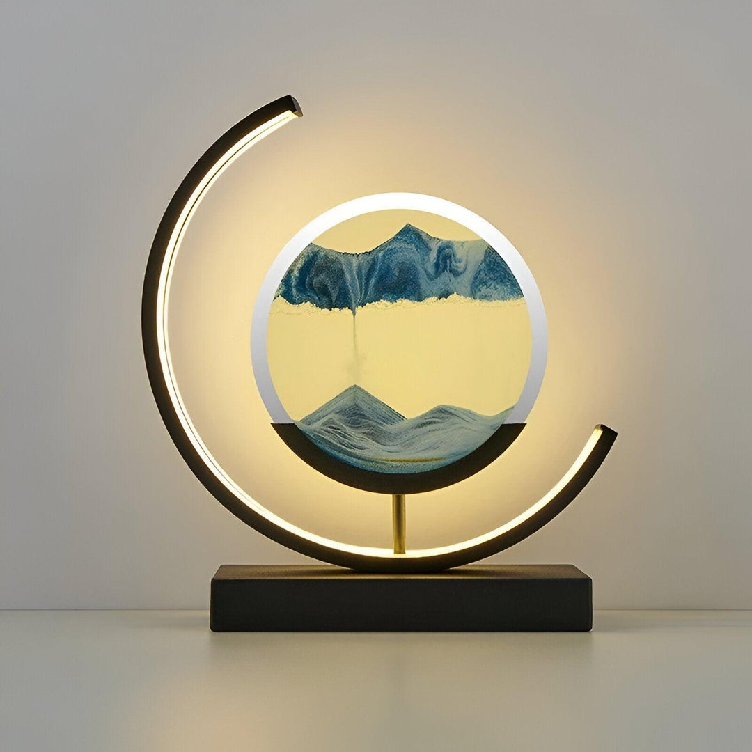 Lampe LED Sand Glow avec sable mouvant, commande à distance, éclairage apaisant, métal et verre, moderne et élégant.