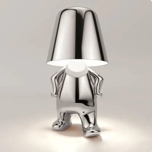 Lampe LED sans fil en or, design sculptural, lumière douce, parfaite pour créer une ambiance chaleureuse et moderne.