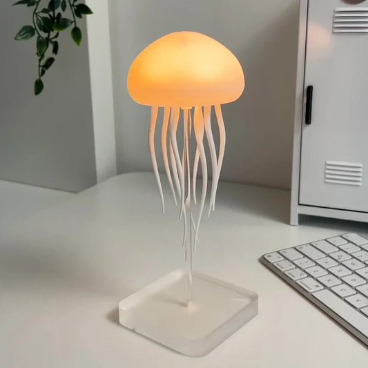 "Lampe méduse LED hypnotique avec couleurs changeantes, simulation mouvement fluide, ambiance relaxante, lumineuse."