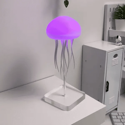 "Lampe méduse LED hypnotique avec couleurs changeantes, simulation mouvement fluide, ambiance relaxante, lumineuse."