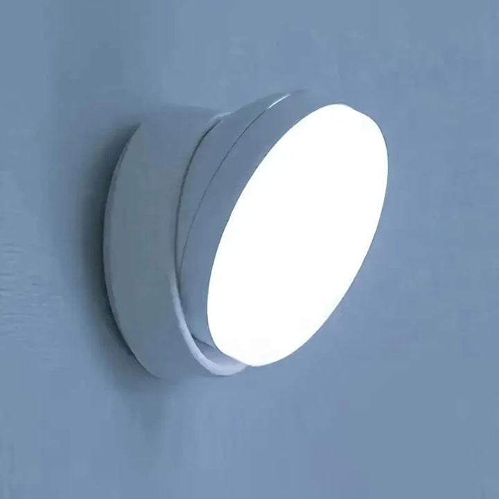 "Lampe murale sans fil design moderne, capteur de mouvement, ajustable à 360°, éclairage blanc chaud ou froid."
