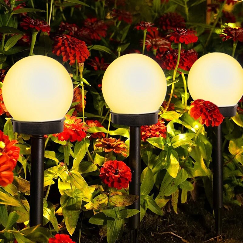 Lampes solaires de jardin LED, étanches et écologiques, design moderne en disque pour éclairage extérieur durable.