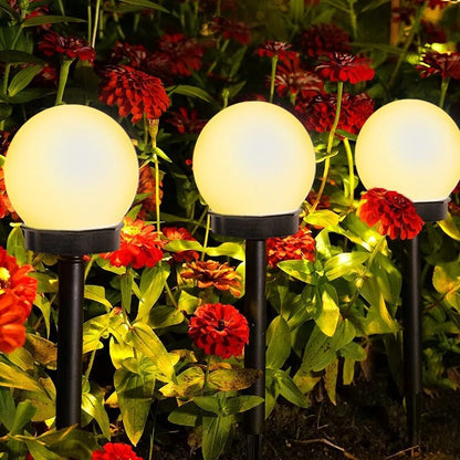 Lampes solaires de jardin LED, étanches et écologiques, design moderne en disque pour éclairage extérieur durable.