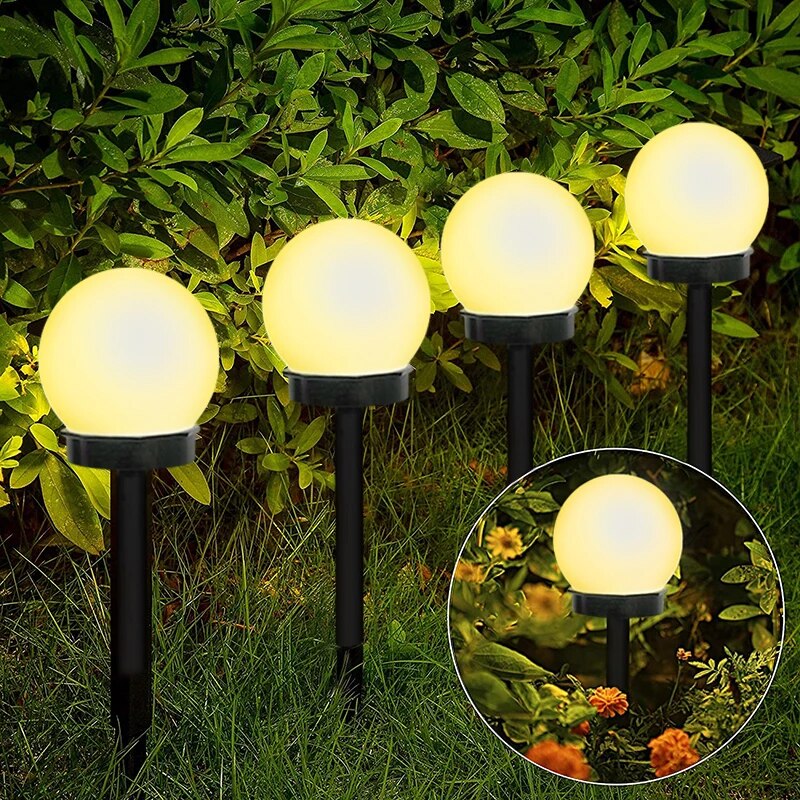 Lampes solaires de jardin LED, étanches et écologiques, design moderne en disque pour éclairage extérieur durable.