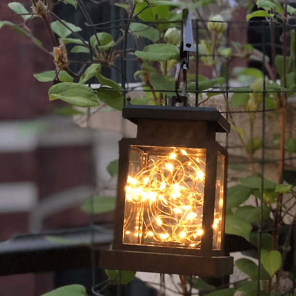 "Lanterne solaire extérieure rétro IP44, métal bronze, éclairage LED, design vintage, idéal jardin."