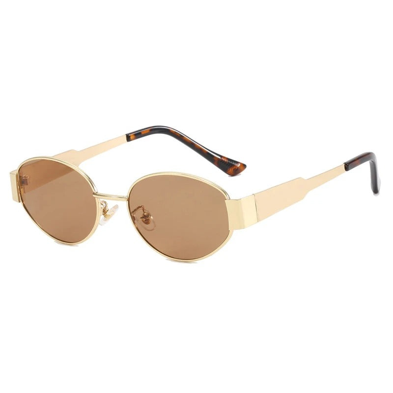"Lunettes de soleil ovales unisexes avec monture métallique chic et lentilles anti-UV pour protection et style ensoleillé."