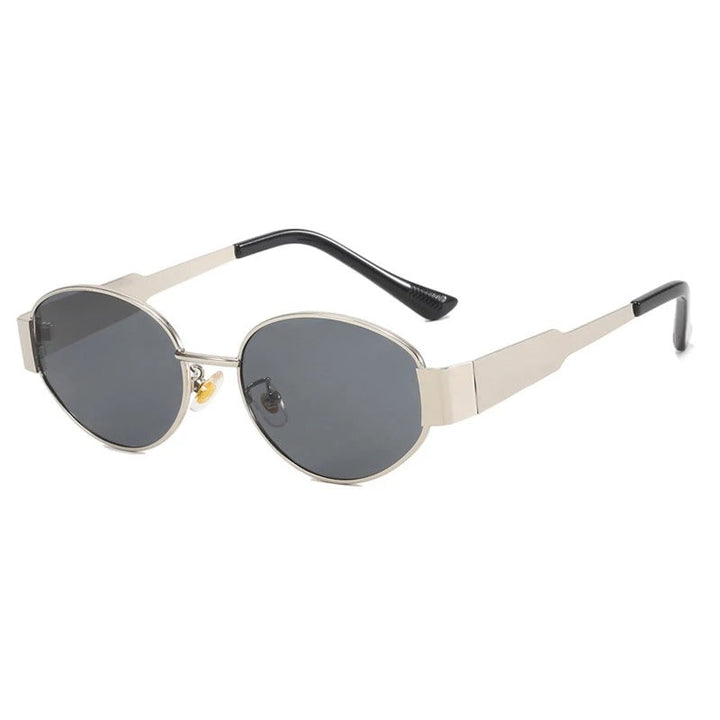 "Lunettes de soleil ovales unisexes avec monture métallique chic et lentilles anti-UV pour protection et style ensoleillé."