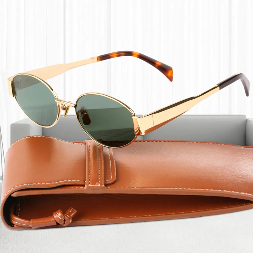 "Lunettes de soleil ovales unisexes avec monture métallique chic et lentilles anti-UV pour protection et style ensoleillé."