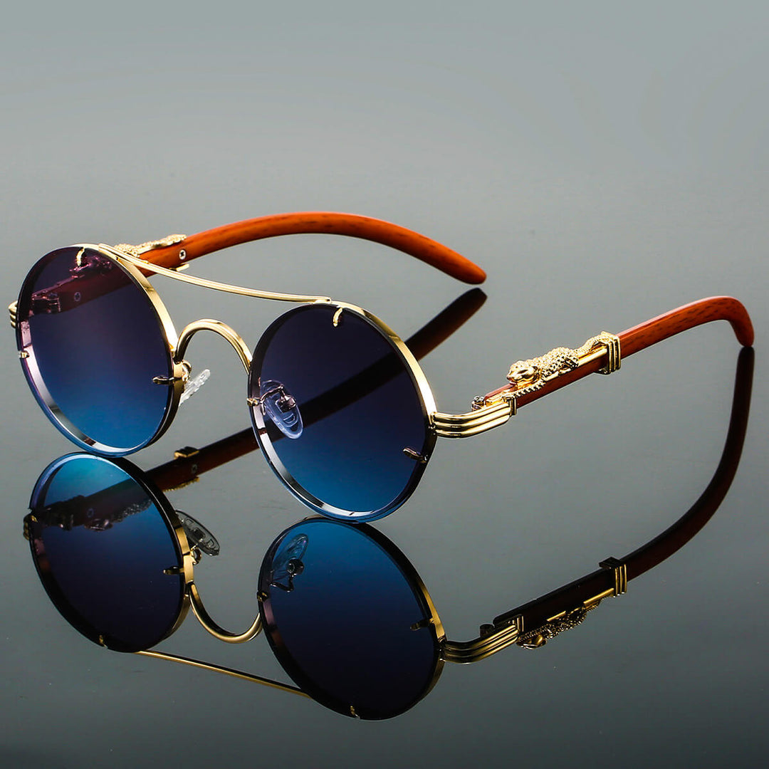 "Lunettes de soleil rétro en métal bleu pour hommes, monture chic, verres UV, accessoire estival élégant."