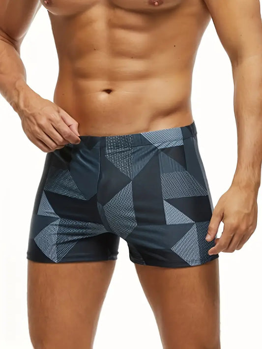 Maillot de bain homme bleu marine, séchage rapide, léger et respirant, idéal pour la plage et aventures aquatiques.