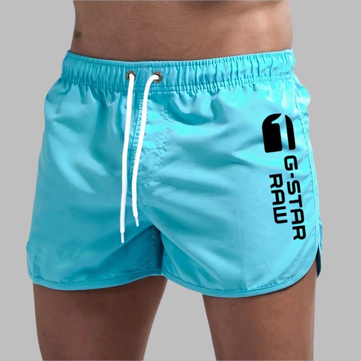 "Maillot de bain homme séchage rapide vert coupe régulière plage piscine"