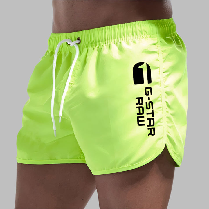 "Maillot de bain homme séchage rapide vert coupe régulière plage piscine"