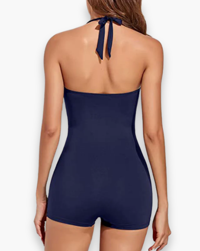 "Maillot de bain une pièce femme élégant, coupe moderne, couleur vive, tissu résistant, parfait pour plage et piscine."