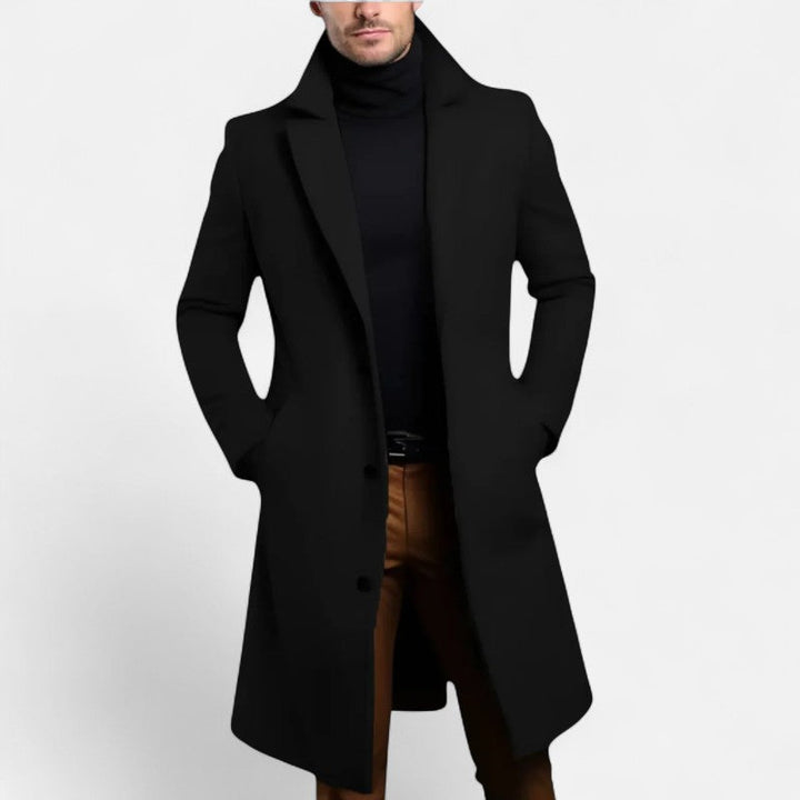 "Manteau homme élégant, ligne épurée, col structuré, stylé et raffiné, silhouette élancée, résistant au froid."
