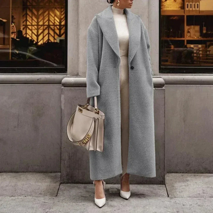"Manteau long d'hiver élégant pour femme en noir, gris ou kaki, design élancé, pour un style sophistiqué et chaleur assurée."