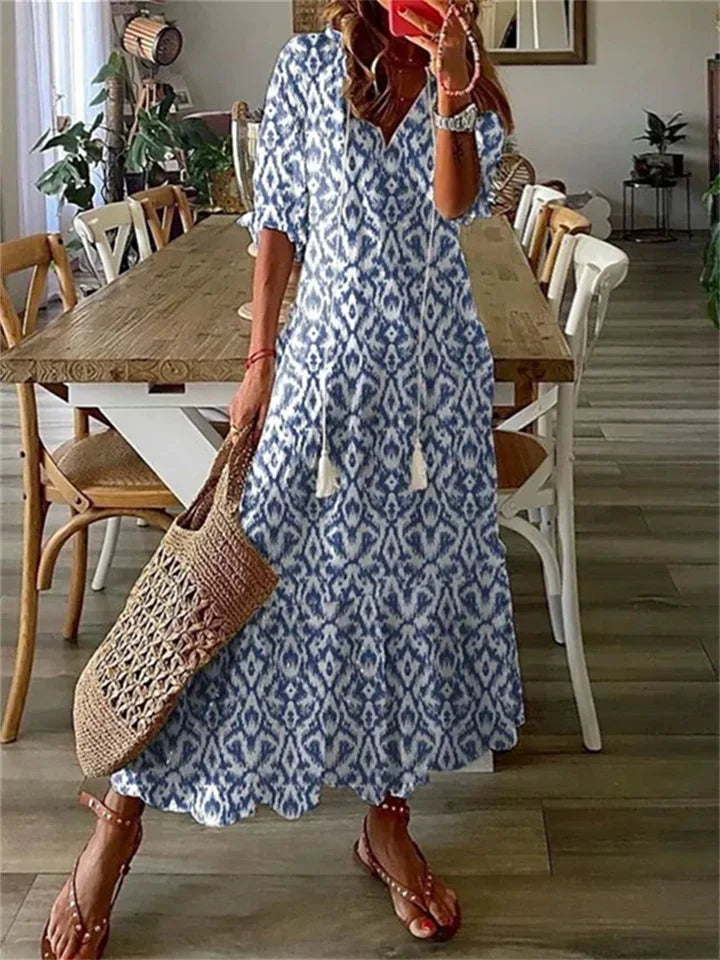 Maxi robe d'été aérée taille plus, longue et élégante avec manches courtes, chic pour les journées chaudes.