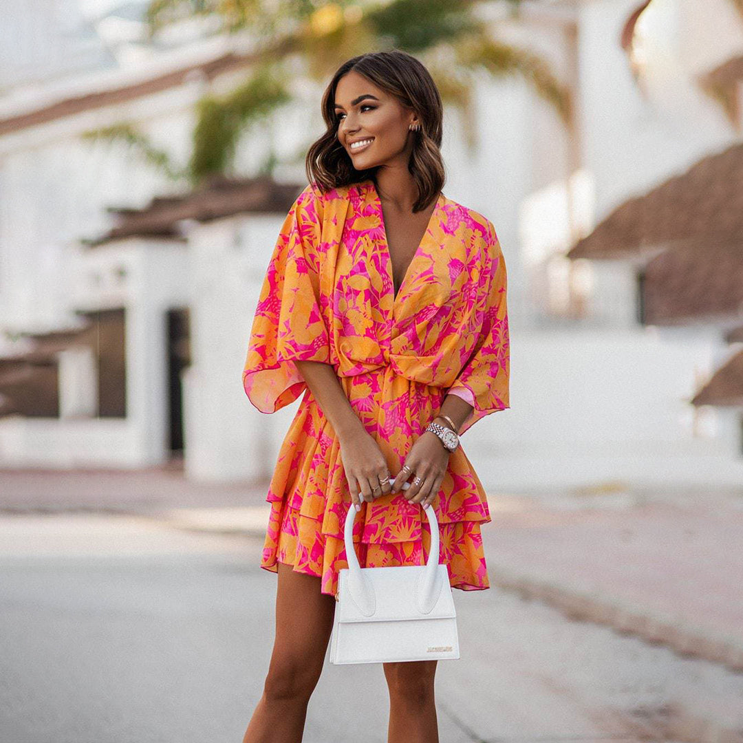 "Mini-robe Fatima orange, élégante et confortable, pour soirées et fêtes, coupe flatteuse et détails raffinés."